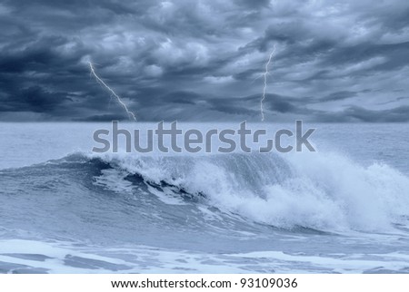 stormy sea with lightning in the sky