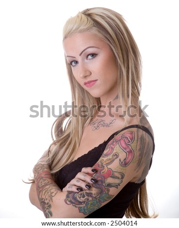photo Attractive young woman all decked out in biker chick with tattoo