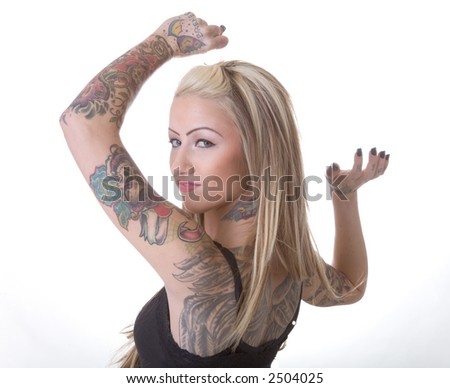 stock photo Tough girl with a bunch of biker chick tattoo