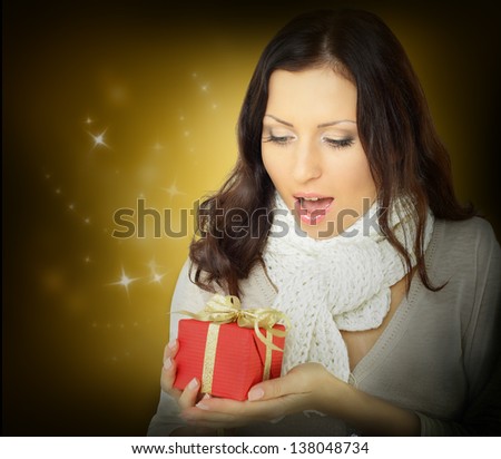 Surprise woman with Christmas gift