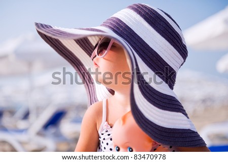 Baby Beach  on Baby Girl In Hat And Sun Glasses On The Beach Stock Photo 83470978