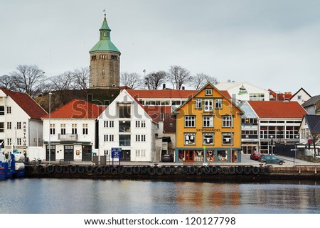 STAVANGER, NORWAY - MARCH 6: Guest harbour with old-style houses on March 6, 2011 in Stavanger, Norway. Stavanger is Norway\'s fourth largest city, and is called the petroleum Capital of Norway.