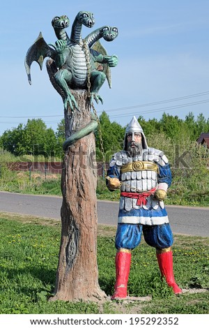 PRIVOLZHSKIY, RUSSIA - MAY 19, 2014: Sculpture of a Russian Bogatyr with Zmey Gorynych (Slavic Dragon). Settlement Privolzhskiy, former Gadovo village, considered as the birthplace of Zmey Gorynych.