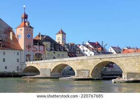 Stone Bridge over Danube, Bridge Tower and Tower of Town Hall in Regensburg, Germany