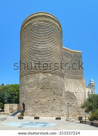 BAKU, AZERBAIJAN - AUGUST 23, 2014: Maiden Tower in the Baku Old City. The Maiden Tower built in the 12th century is one of the most noted landmarks and Azerbaijan's most distinctive national emblems.