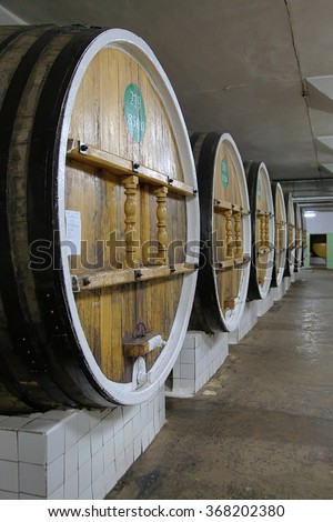 MASSANDRA, CRIMEA - MARCH 7, 2009: Huge barrels for aging fine wines in the cellar of Massandra winery. The Crimean oldest winery Massandra was built 1894-1897 near Yalta, Crimea.