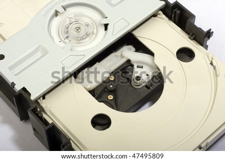 Inside parts of the computer CD/DVD drive.
