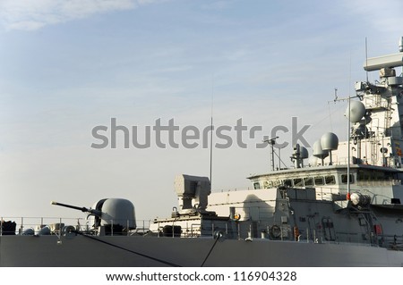 Military anti-submarine ship, ship gun and modern system of a radar.