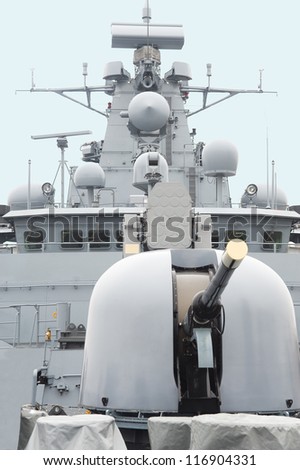 Military anti-submarine ship, ship gun and modern system of a radar.