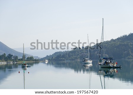 Europe, Mediterranean Sea, islands of Greece. Yachts in a bay at the island of Corfu.