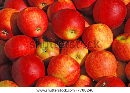 Sale of red, ripe apples on a market