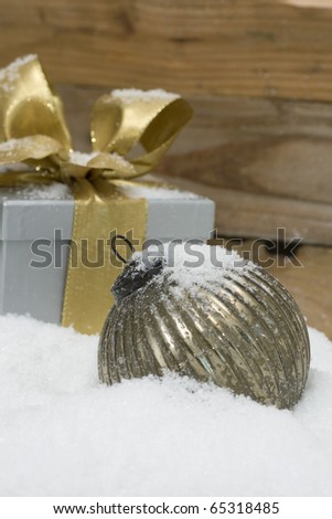 Silver sphere and gift for christmas in country style