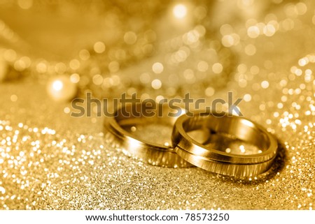 stock photo Wedding rings in gold and pearls