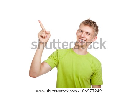 young happy smile man standing hold pointing finger up at corner, handsome guy wear green shirt, isolated over white background, studio shoot