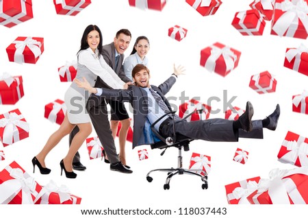 excited Business people group team push man leader colleague sitting in chair, gift box presents fall fly around, young businesspeople smile, Isolated over white background