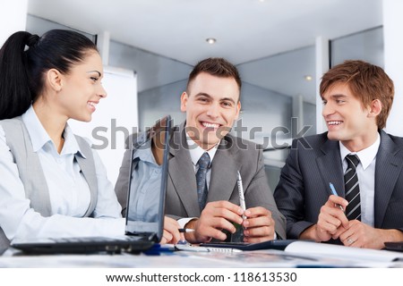 Group of business people happy smile work together, businesspeople working at meeting with colleague team sitting at desk in office
