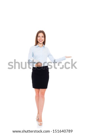young businesswoman smile hold open palm with empty copy space, business woman showing hand sign to side, concept of advertisement product, full length portrait isolated over white background