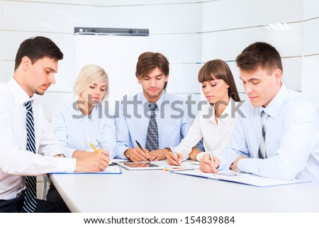 business people serious working document sign up, conference meeting, group businesspeople team sitting at desk in office, writing paperwork