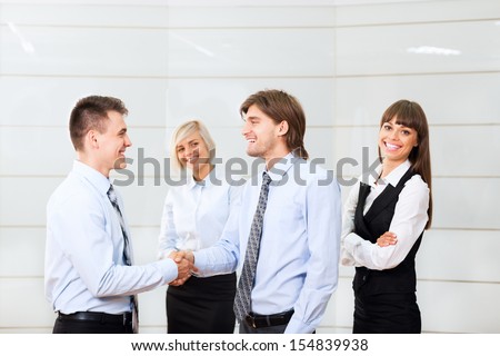 happy smile businessmen handshake standing at office, businesspeople hand shake, business people congratulating men partner, meeting at conference hall