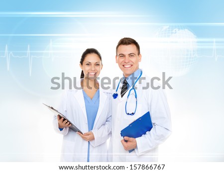medical team doctor man and woman smile with stethoscope hold folder. Happy toothy smiling wear white lab coat over abstract blue medic health care background