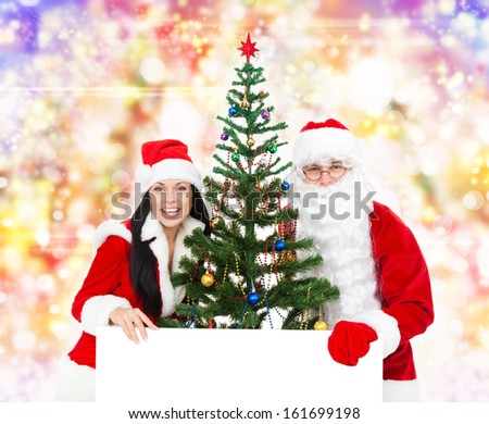 Santa Claus christmas girl, tree hold white board with empty copy space for text, present new year over abstract colorful lights background