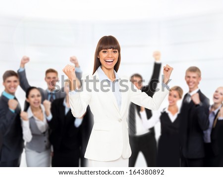 Business people group success team, woman raised arms hands up, businesspeople smile hold fist ok yes gesture in office