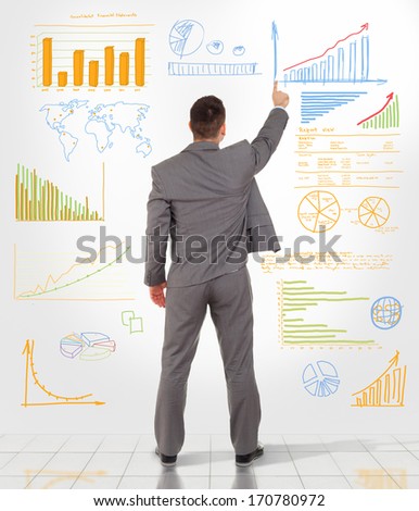 Business man draw graph finance chart diagram, back view businessman drawing sketches on wall, full length