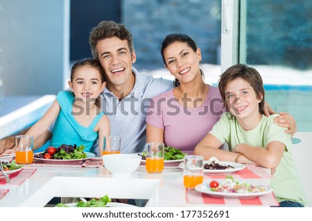 couple family lunch home, eating happy love smile, sitting at dinner table