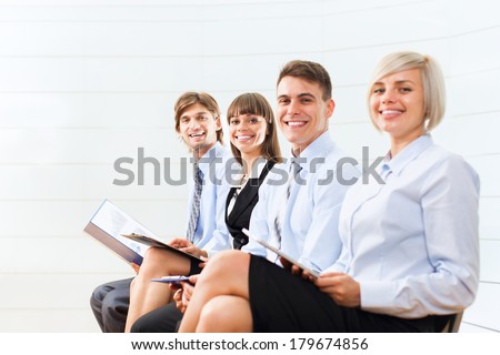 business people group smile sitting row, line in office meeting conference room, businesspeople interview with colleague, human resources