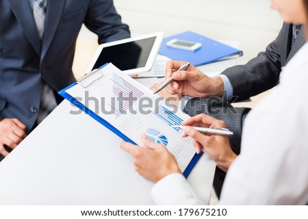 business people hands analyst team work group during conference discussing financial diagram, graph, business charts, businesspeople accounting meeting at desk office point finger graph document