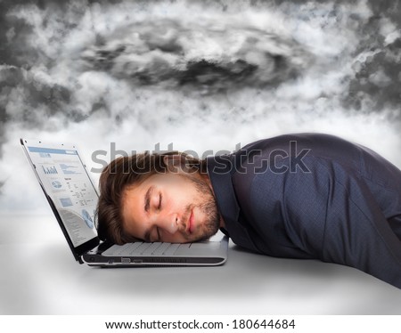 businessman sleep at office desk with dark storm cloud, business man crisis concept problem, negative emotion, closed eyes lying head on laptop