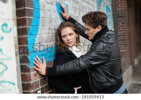 http://image.shutterstock.com/display_pic_with_logo/534712/181059413/stock-photo-couple-conflict-on-street-aggressive-man-hold-young-sad-woman-leaning-on-wall-violence-sex-crime-181059413.jpg