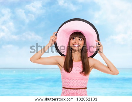 summer vacation woman looking to empty copy space blue sky ocean beach background, wear pink dress and hat happy smile, young girl holiday on sea sunny day