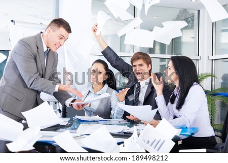 business people conflict problem, team working throw papers, documents fly in air,, businessmen and women serious argument negative emotion, businesspeople meeting at desk office