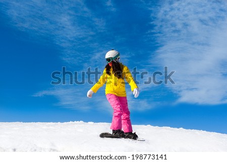 Snowboarder sliding down the hill, snow mountains snowboarding on slopes