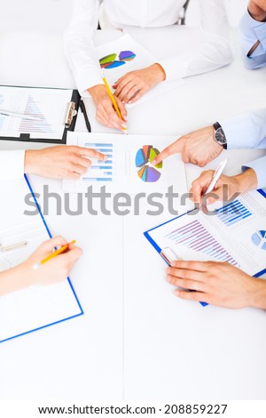 business people hands analyst team work group during conference discussing financial business charts, businesspeople accounting meeting sitting at desk office point finger at graph document