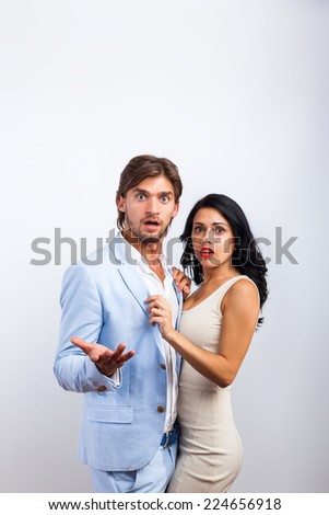 couple confused scary emotion over gray background