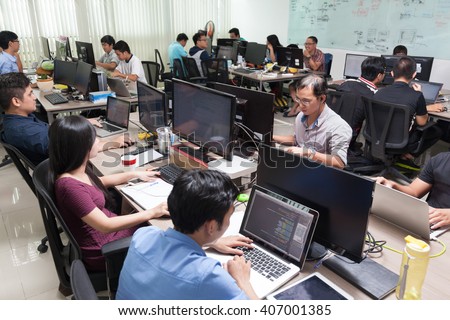 Asian Software Developers Business People Sitting Desk Working Laptop Computer Businesspeople Team Real Office