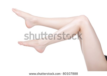 beautiful attractive  female legs barefoot lying on white background, beauty hip concept.
