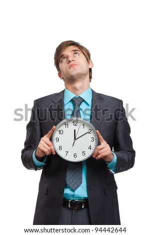 businessman hold clock think up to empty copy space, handsome young business man happy smile wear elegant suit and tie isolated over white background