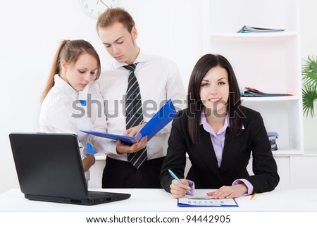 young businesswoman happy smile looking at camera at office, businesspeople colleagues on background people working, business man and woman discussing the problem, business plan, papers document