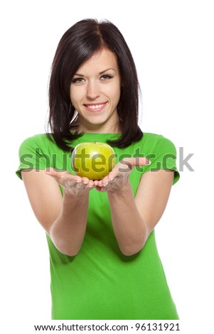 pretty excited woman happy smile hold green fresh apple in hand, young attractive girl wear green shirt, isolated over white background