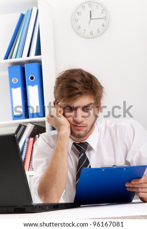 business man read document, contract, hold in hands and looking at clipboard, businessman sitting at the desk, at office