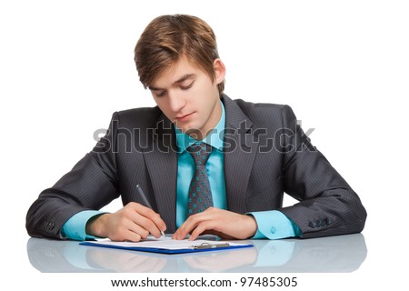 Handsome young business man writing, businessman working with documents sign up contract, sitting at the desk at office, wear elegant suit and tie isolated over white background