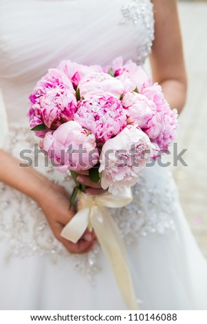 Beautiful wedding bouquet in bride\'s hand