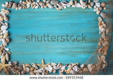 Summer holidays background in blue with fishing net ans seashells and a space for advertising