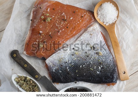 Smoked marinated salmon and ingredients on the kitchen table