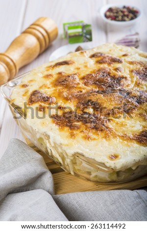 Baked salted cod with cream Portuguese style dish