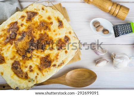 Baked salted cod with cream Portuguese style dish
