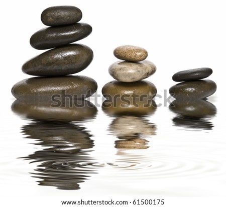 Zen balance with stones on a white background.